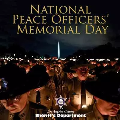 Hundreds of peace officers holding candle vidual