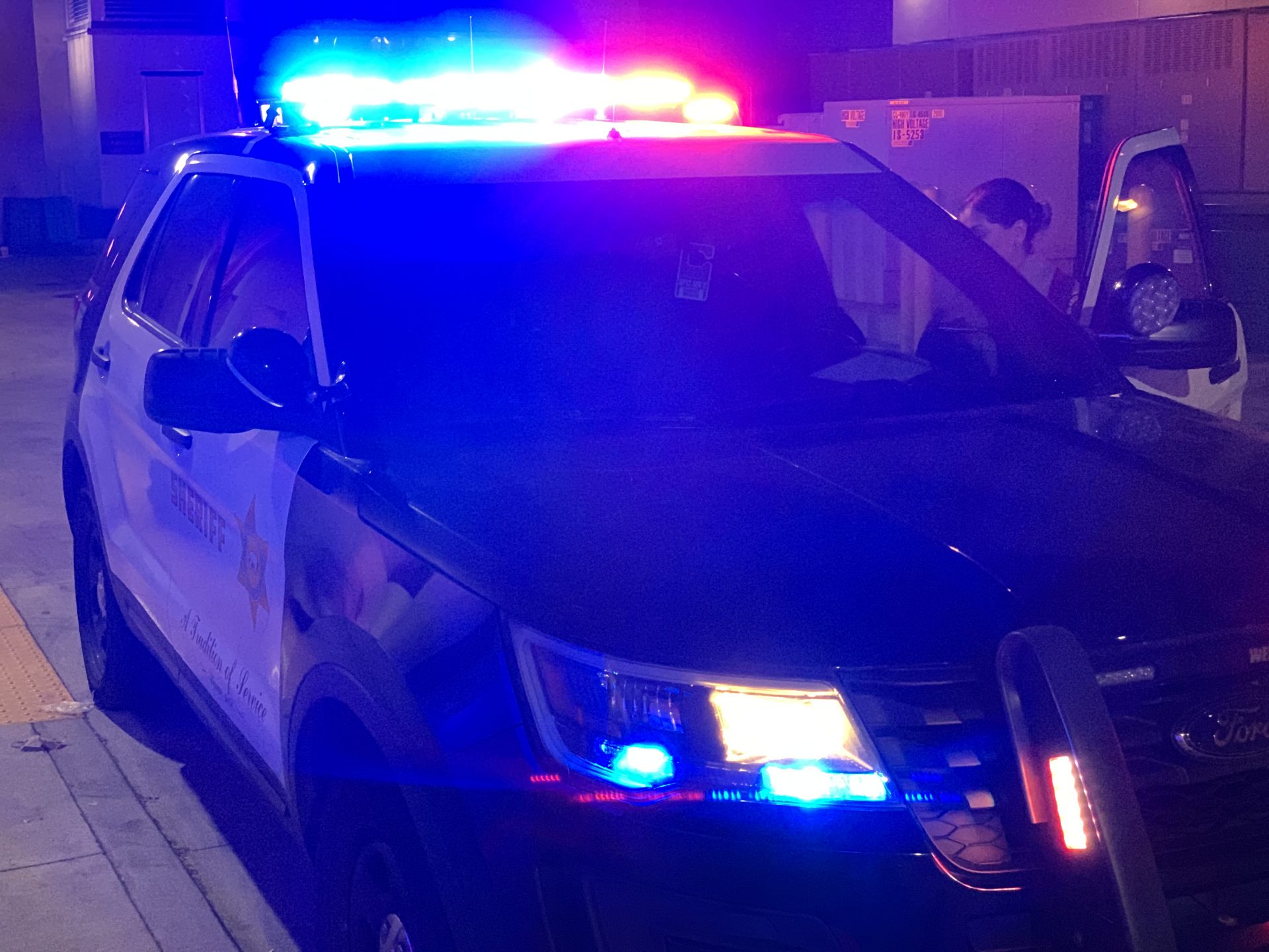 Patrol car with red lights on