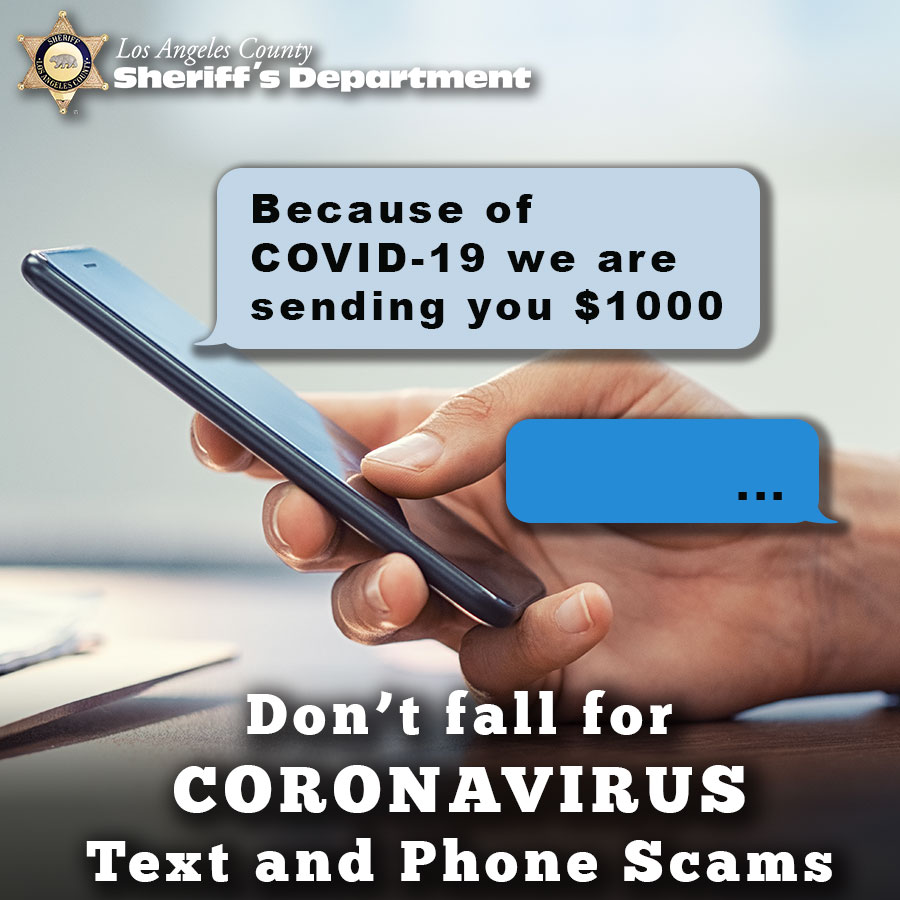 Person using a mobile phone with a message from an unkown sender reading, "Because of Covid-19 we are sending you $1000"