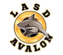 Circular Logo. LASD in black around the top. AVALON on the bottom. Center of circle is yellow with cartoon of a shark popping out of the center of logo.